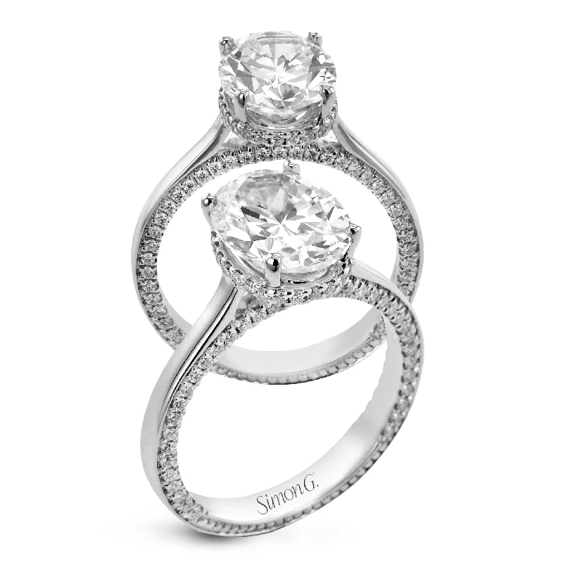 cushion cut halo engagement rings -Oval-cut Hidden Halo Engagement Ring in 18k Gold with Diamonds