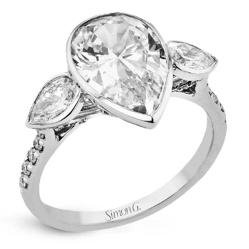 wedding engagement rings -Pear-cut Three-stone Engagement Ring in 18k Gold with Diamonds