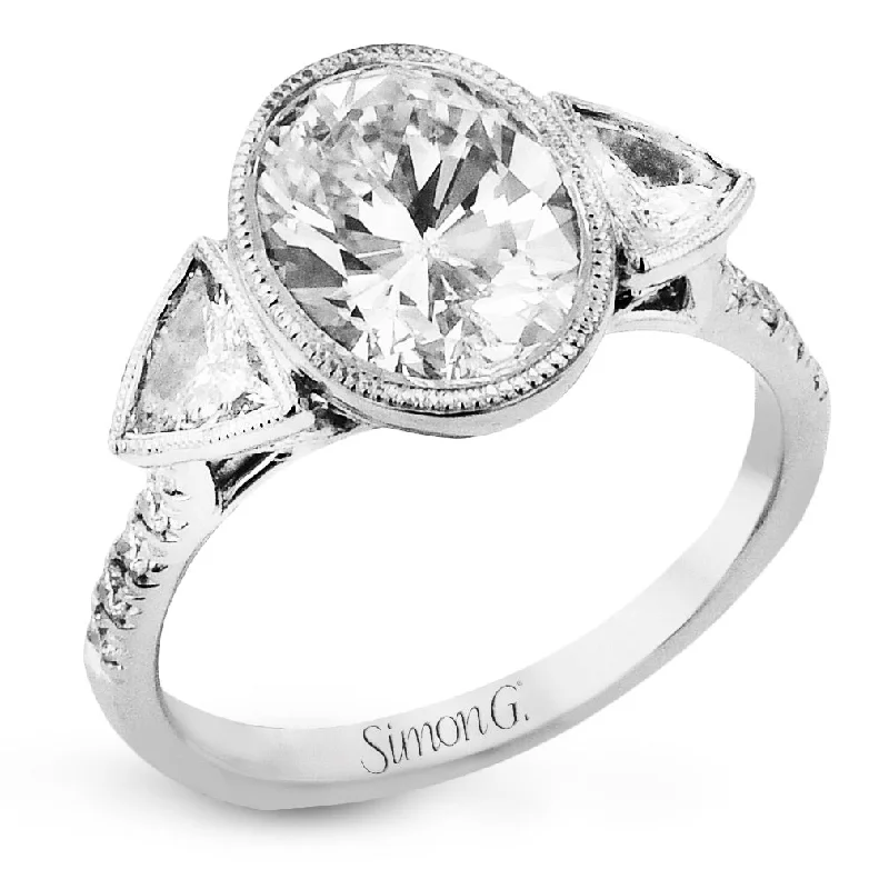 budget engagement rings -Oval-cut Three-stone Engagement Ring in 18k Gold with Diamonds