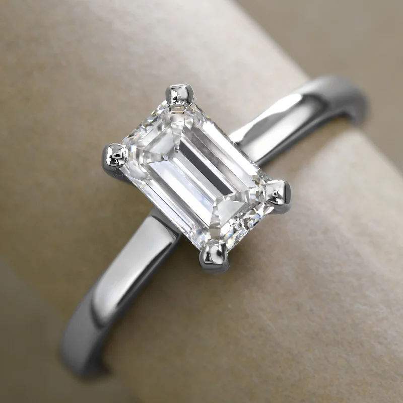 women statement rings -Sleek Emerald-Cut Diamond Solitaire